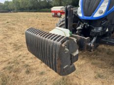 Tombstone 3pt linkage front weight, with 16 x Case 45kg leaf wafer weights