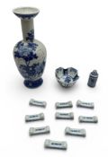 A JAPANESE BLUE AND WHITE VASE, TOGETHER WITH A JAPANESE BOWL, SNUFF BOTTLE, AND VARIOUS BRUSH RESTS