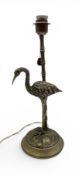 A SILVER PLATED GILT TABLE LAMP WITH A STORK BESIDE A BAMBOO SHOOT