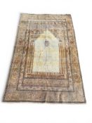 A 19TH CENTURY PERSIAN SILK CARPET