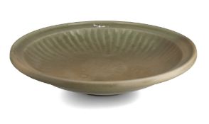 A CHINESE YUAN-MING DYNASTY CELADON DISH