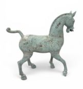 A CHINESE TANG STYLE METAL HORSE, TOGETHER WITH A STONE BUDDHA