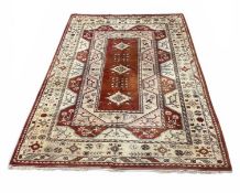 A LARGE TURKISH RUG