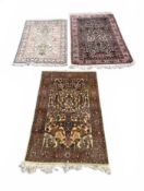 THREE PERSIAN RUGS
