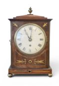 A REGENCY MAHOGANY AND CUT-BRASS BRACKET CLOCK