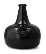 AN EARLY 18TH CENTURY ONION SHAPED WINE BOTTLE SEALED AND DATED 1716