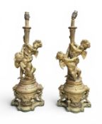 A PAIR OF GILDED CHERUB LAMPS