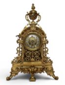 A VICTORIAN BRASS MANTEL CLOCK