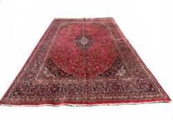 A PERSIAN KASHAN CARPET