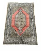 A PERSIAN SILK CARPET