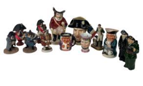 A GROUP OF 19TH CENTURY AND LATER CHARACTER JUGS AND FIGURES