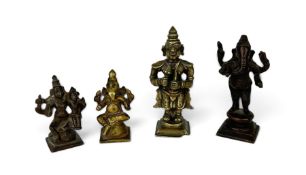 FOUR EARLY SOUTH INDIAN BRONZE HINDU DEITIES