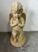A garden statue of an angel H22cm