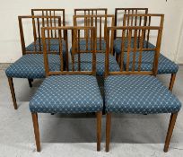 Eight George Russell Mid Century dining chairs upholstered in blue