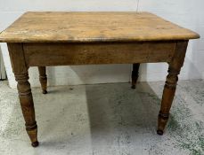 A pine kitchen table on turned legs with drawer to end - 75cm x 115cm x 79cm