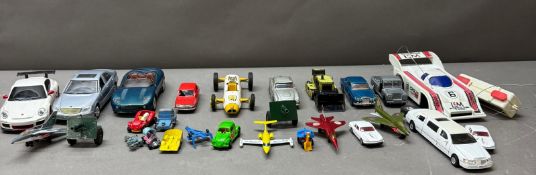 A selection of diecast vehicles varying styles and makers.