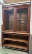 A mahogany glazed bookcase with two shelves under. Height 240 cm 47x148 cm Condition Report Age