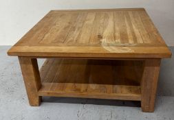 A light oak square coffee table shelf under H150cm SQ100cm Condition Report staining to top ad age