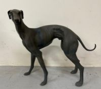 A cast iron garden statue of a Whippet H55cm W66cm Condition Report good condition
