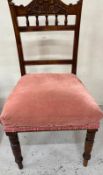 A bedroom chair upholstered in pink having a carved top rail Condition Report good