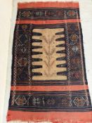 A Kilin rug, red grounds with hand woven centre pattern 170cm x 90cm Condition Report fraying to