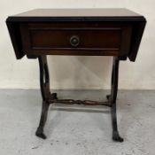 A reproduction drop leaf side table with single drawer on brass castors H54cm W49cm D35cm