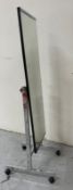 A contemporary full-length cheval mirror on castors H150cm W51cm D44cm