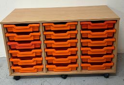 A small tray storage unit with coloured trays 104cm x 47cm x 61cm High.