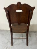 A Bentwood hall chair with cut out back rest, embossed scrolls (H103cm)