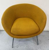 A Mid Century Heals tub chair upholstered in a mustard fabric on chrome legs Condition Report some