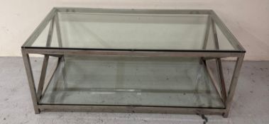 A contemporary chrome and glass X frame coffee table H70cm W60cm D40cm Condition Report some