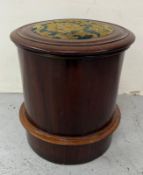 A cylindrical mahogany stepped commode with a needlework top and lidded ceramic insert Height 45cm x