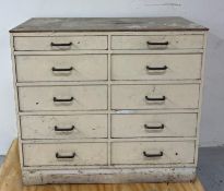 A vintage industrial apothecary multi-drawer cabinet with a cream weathered finish H90cm W100cm