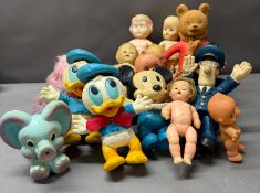 A selection of plastic and squishy toy figures to include Donald Duck and Postman Pat