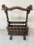 Brutalist style carved wooden magazine rack (H66cm W48cm D20cm) Condition Report solid, good general