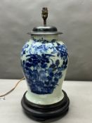 An 18th/19th Century Chinese vase lamp conversion, cobalt blue under glaze on wooden stand,