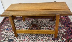 A Mid Century coffee table in light oak H38cm W87cm D45cm