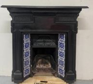 Victorian cast iron fire place with classical mouldings and tiled panels (H127cm W130cm D19cm(
