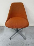 A Mid Century orange Maurice Burk swivel chair Condition Report wear and staining to fabric,
