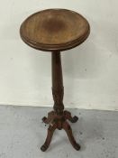 Light oak plant stand on turned central column (H79cm x Dia29cm)