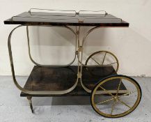 An Aldo Tura Goatskin brass loop bar trolly on cart wheel effect castors and wheels H80cm W78cm
