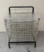 A spring-loaded artist drying rack H80cm W63cm D55cm Condition Report chips and wear