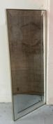 A contemporary bevel-edged faceted wall mirror 60cm x 135cm