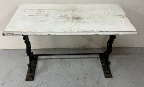 A repurposed console table with cast iron legs. H 71cm x D 56cm x W 106cm