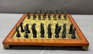 A chest board and set featuring Byzantine themed pieces