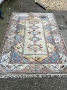 Light pinks, blue and cream rug 290cm x 210cm