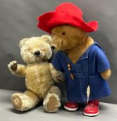 Paddington bear along with a vintage jointed bear