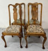 Queen Anne style dining chairs on cabriole legs with passed seats