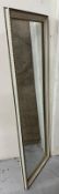 A white and gilt floor-length wall hanging mirror 45cm x 130cm