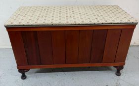 A small panelled blanket box with upholstered seat on cabriole legs H45cm W77cm D34cm Condition